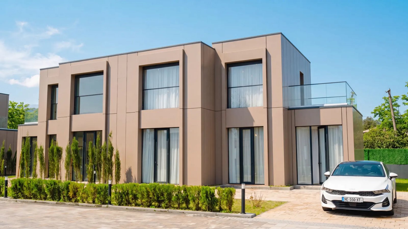 Completed Villa Park residence with landscaping, balcony and driveway